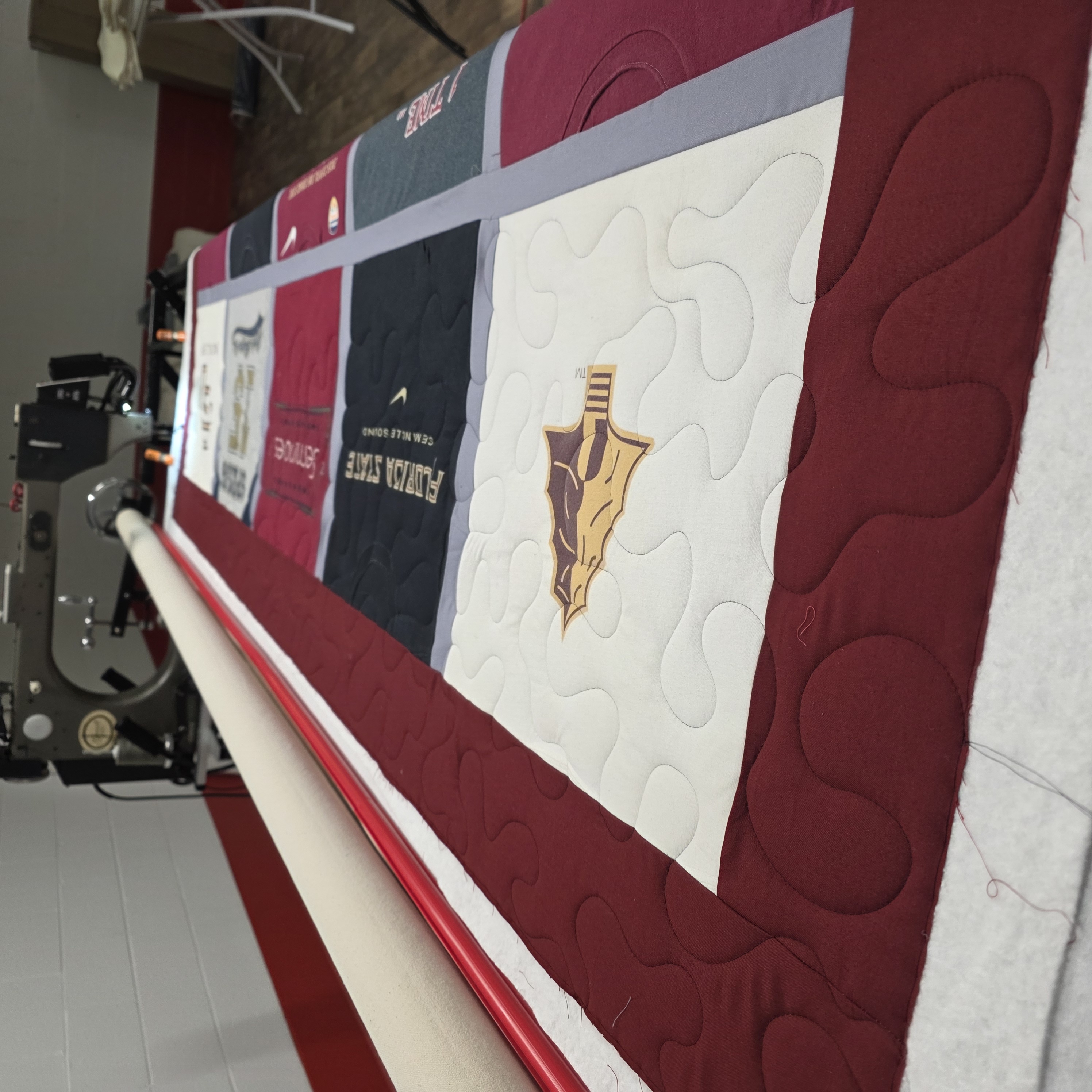 Stitch Arena side view with long arm quilting machine